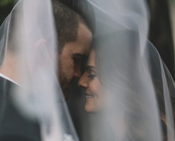 Photo by Nathan Dumlao woman touching chest of man