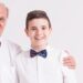 Grandfather and grandson in bow ties