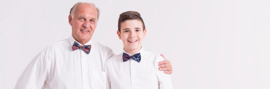 Grandfather and grandson in bow ties