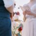 The bride reads a wedding speech to groom. Beautiful moment from a wedding ceremony in nature.