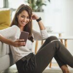 Woman Typing A Text Message