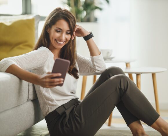 Woman Typing A Text Message