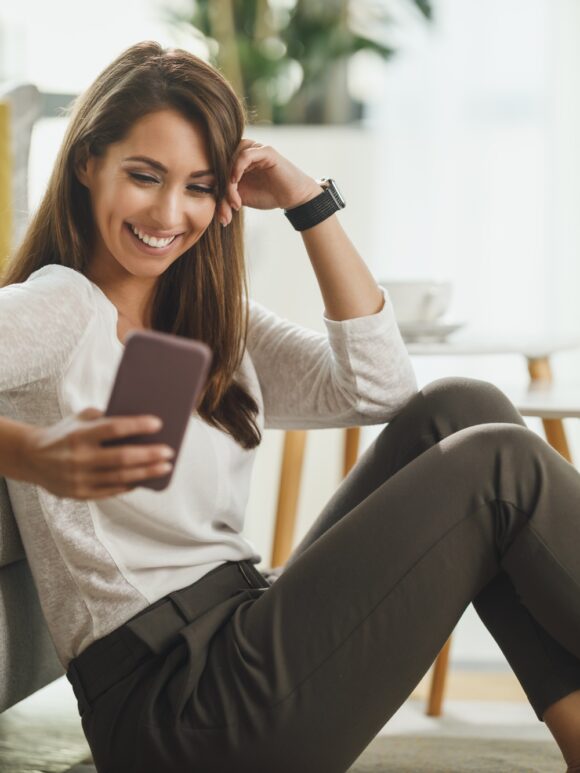 Woman Typing A Text Message