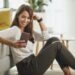 Woman Typing A Text Message